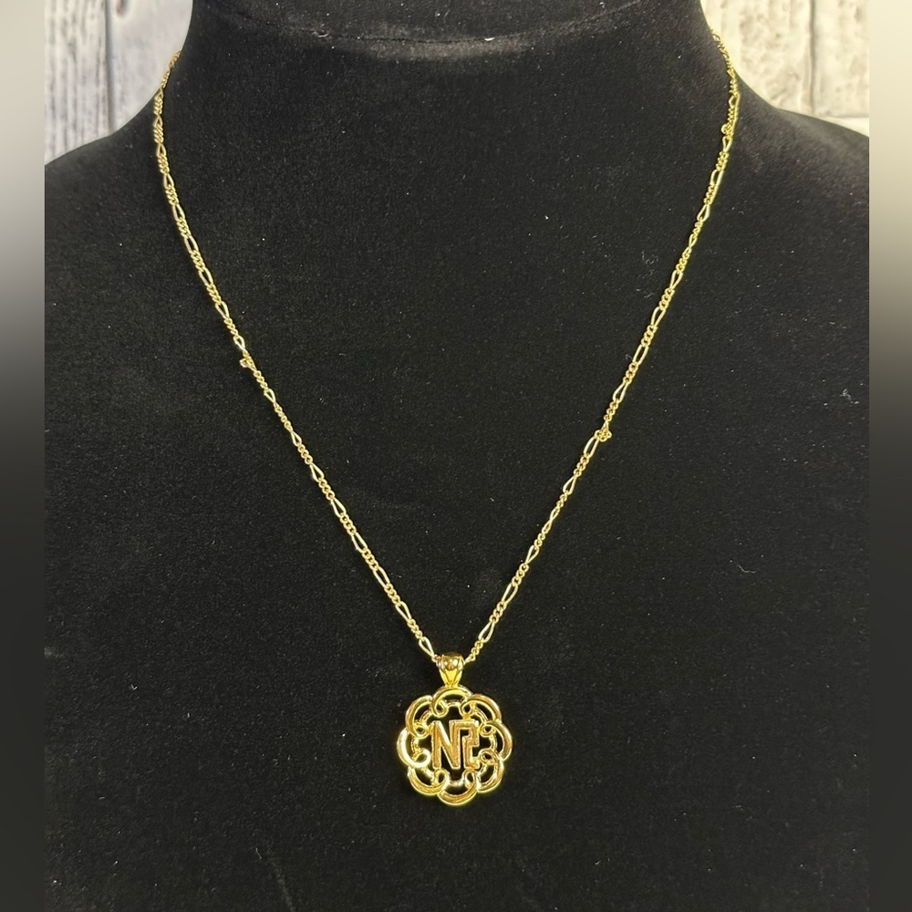NINA RICCI gold plated plaque necklace